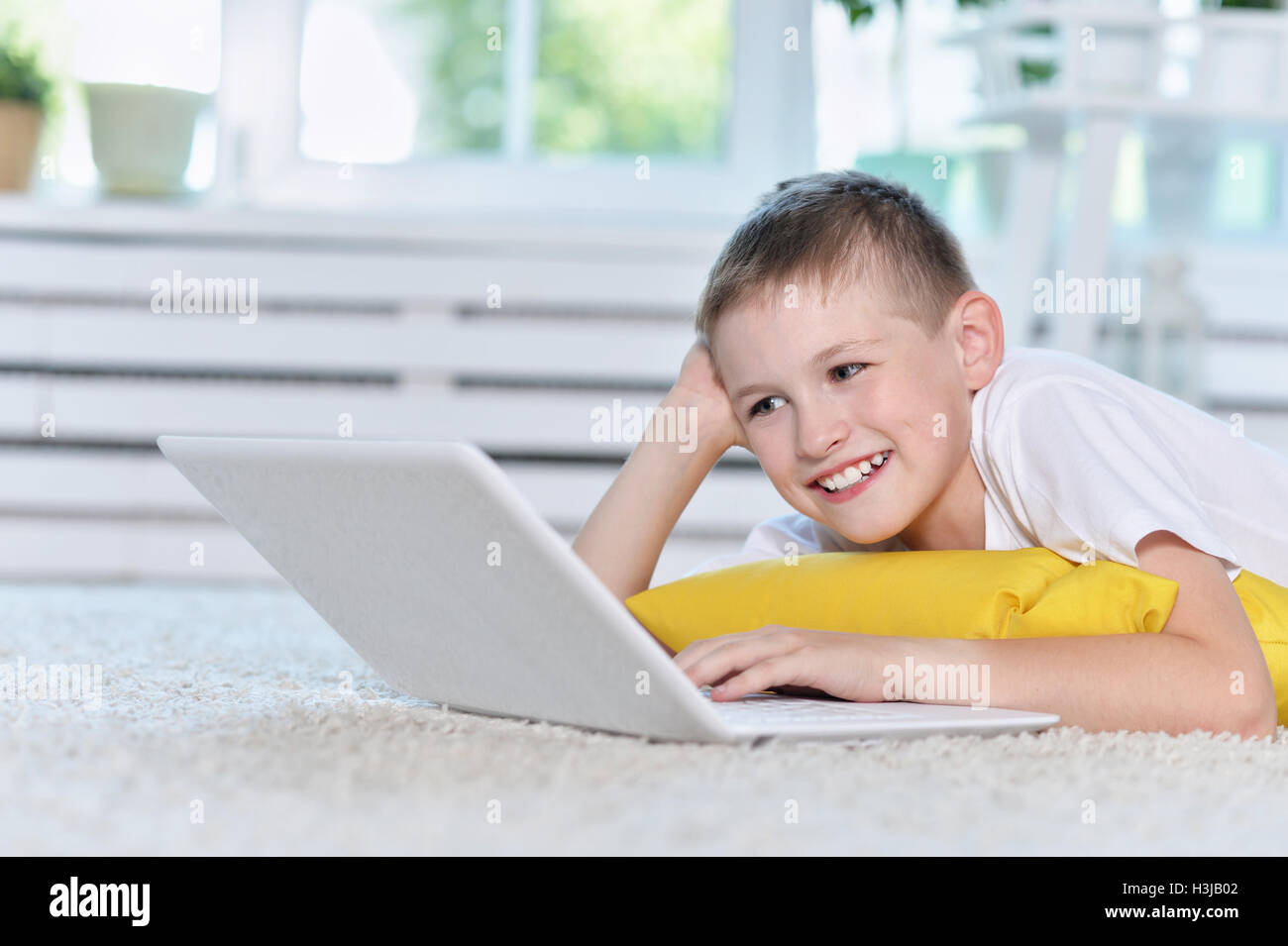 Boy watching at monitor hi-res stock photography and images - Alamy