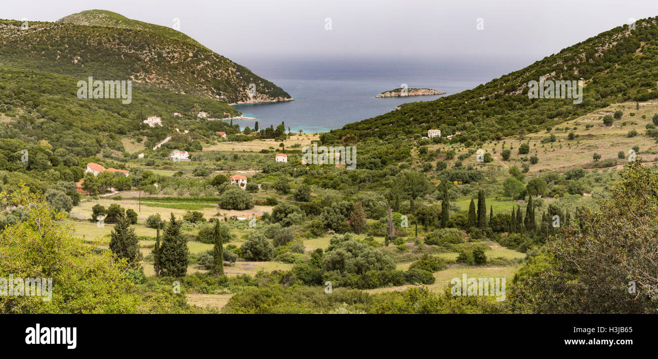 Atheras, Kefalonia surrounded by a beautiful landscape of olive tree covered hills and sea. Stock Photo