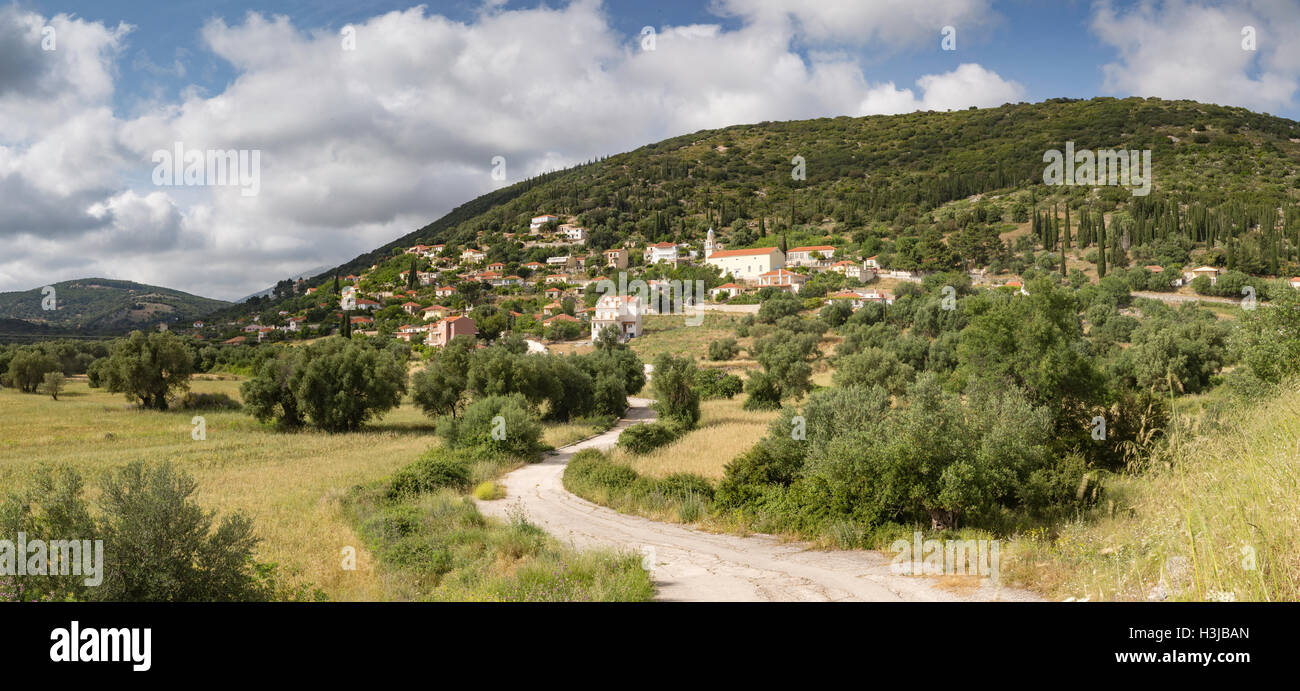 Troianata is a picturesque village on the side of a hillside in Cephalonia. A winding road leads up to the villlage. Stock Photo