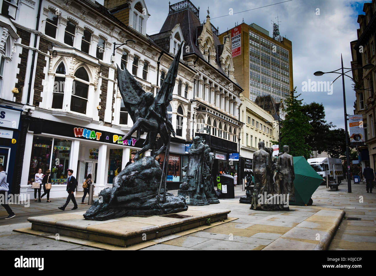 The Chartist sculpture in Newport town centre, commemorating the 20 people who died during a political uprising there in 1839 Stock Photo