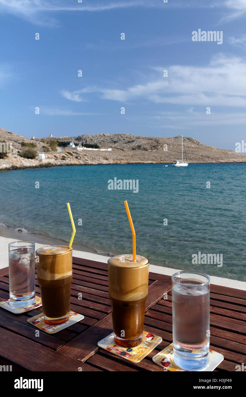 Frappé coffee drink, Pondamos or Pontamos Beach, Chalki Island near