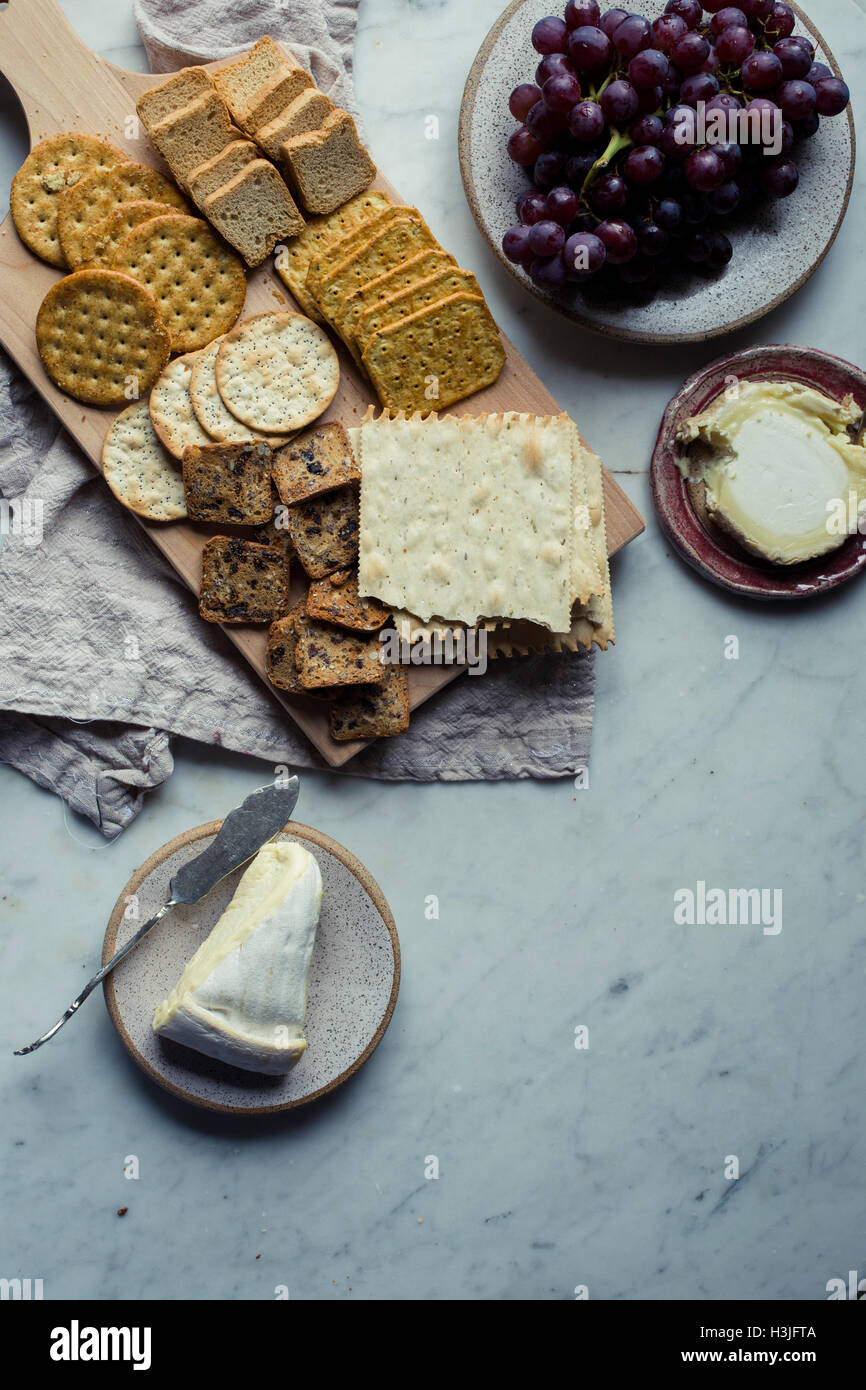 Cheese, grapes and Crackers Stock Photo