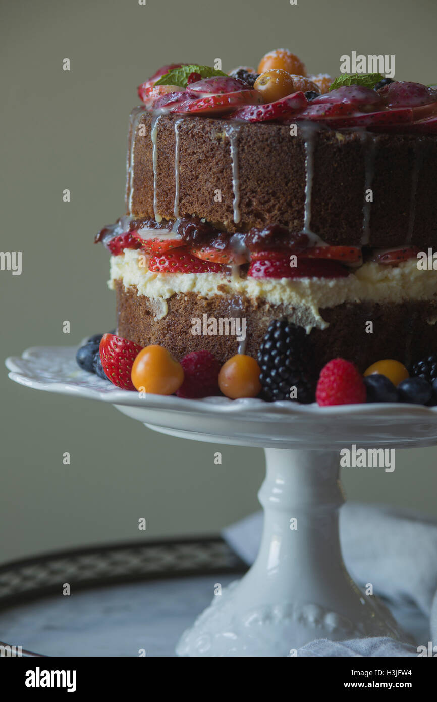 Vanilla cake decorated with fresh fruit Stock Photo Alamy