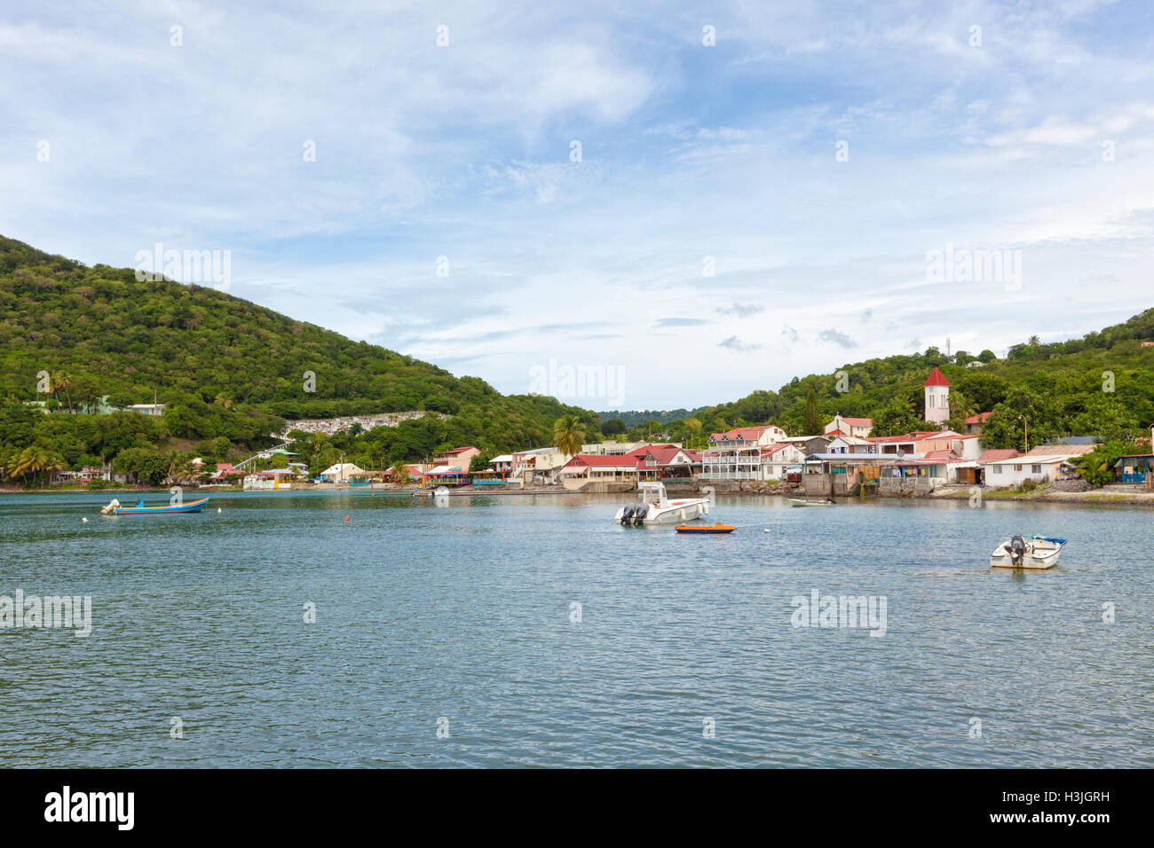 Village and harbor of Deshaies, Basse-Terre, Guadeloupe Stock Photo