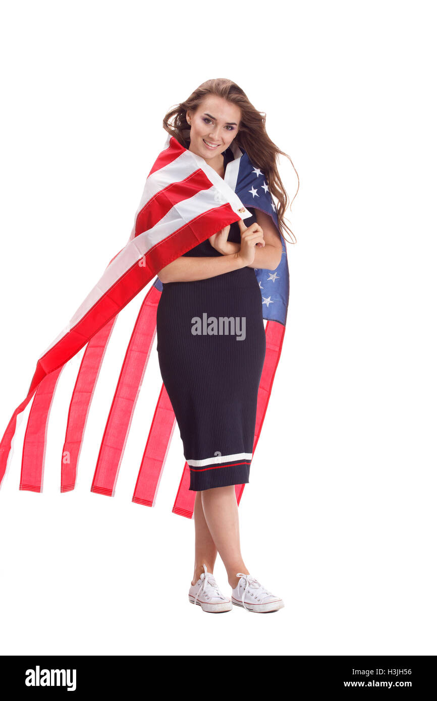 Happy young woman holding USA flag. Image isolated on a white ...