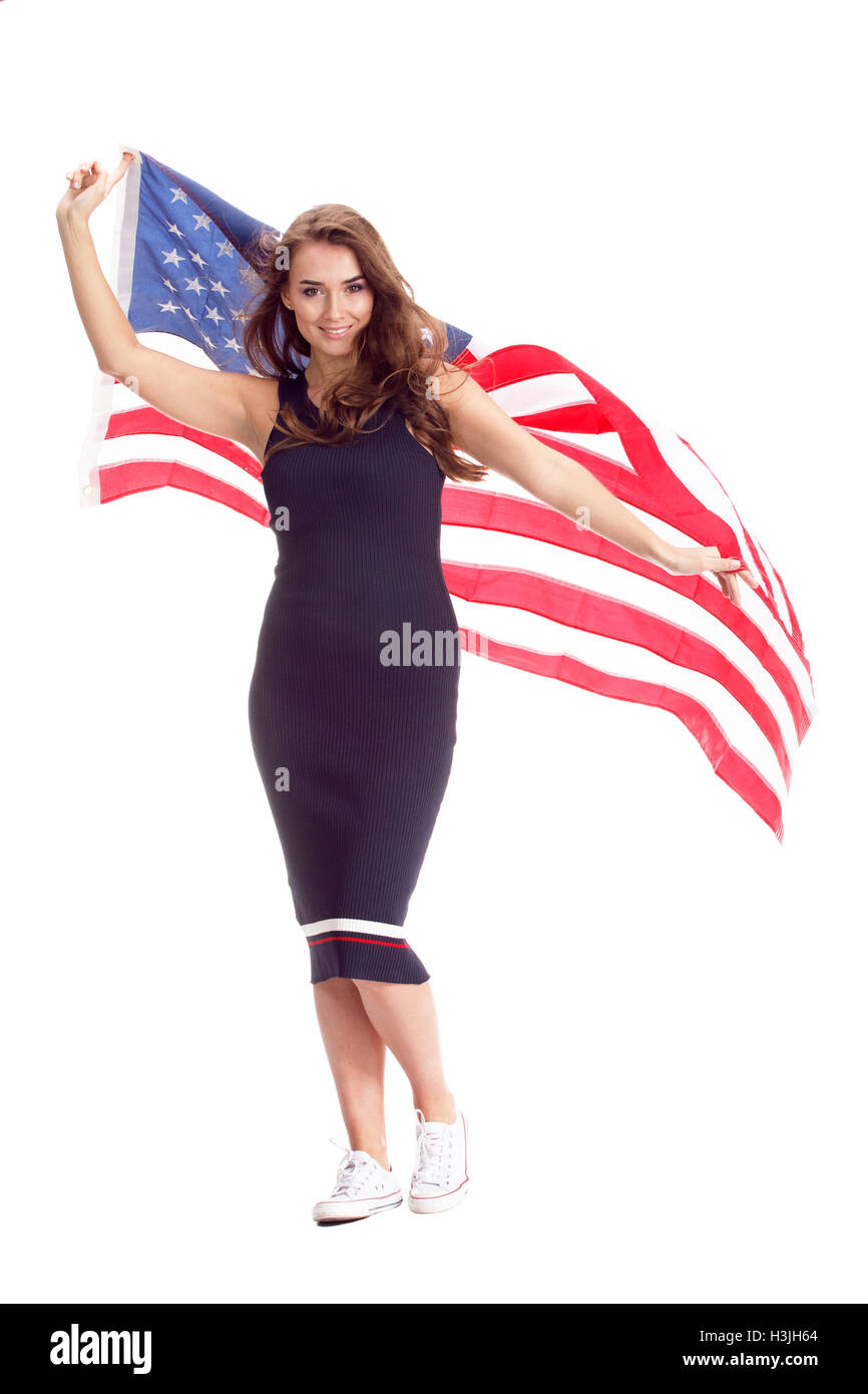 Happy young woman holding USA flag. Image isolated on a white ...
