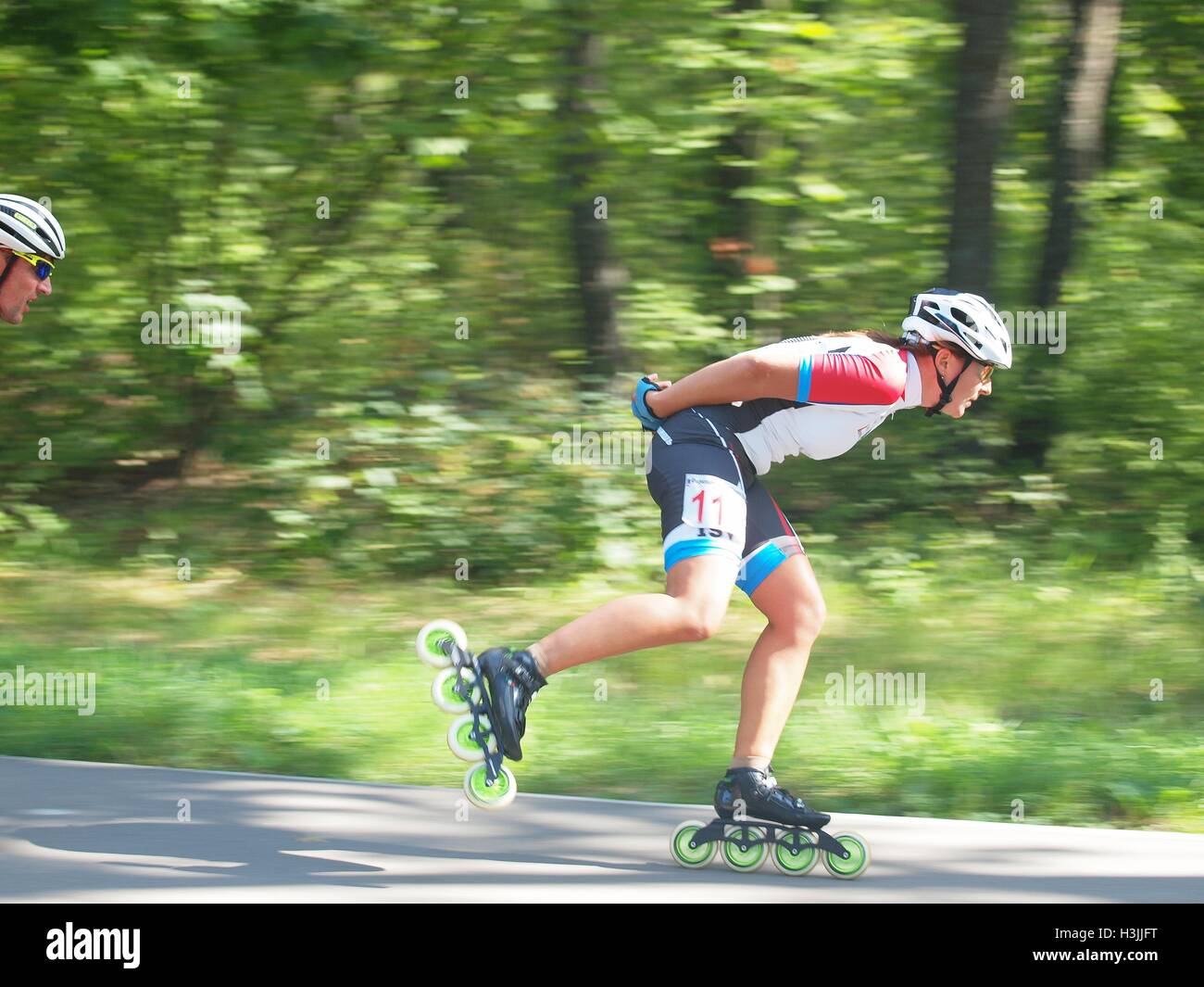 Woman athlete on roller skates Stock Photo Alamy