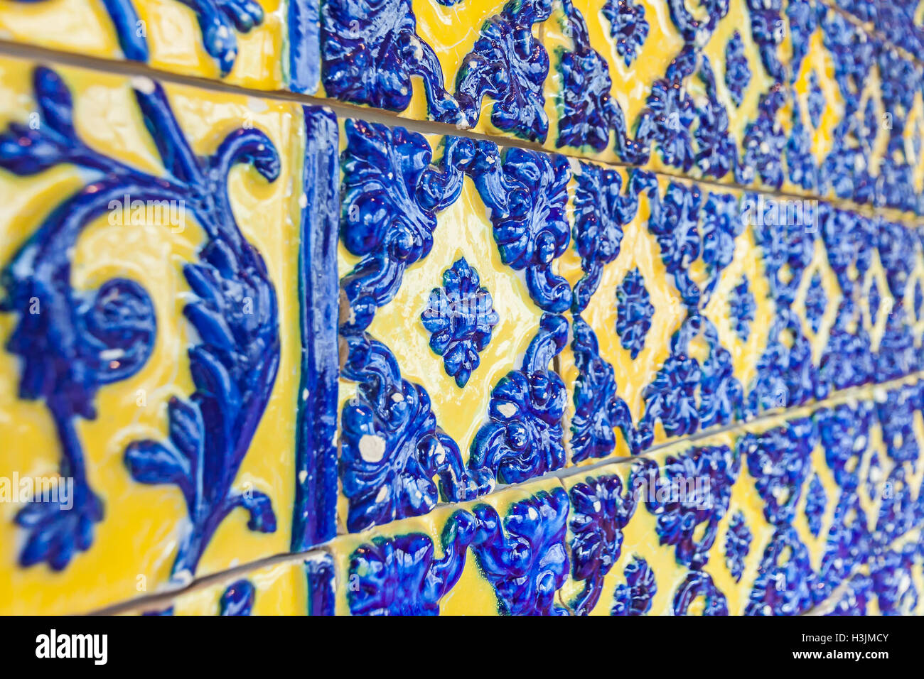 Details of typical Portuguese old ceramic wall tiles (Azulejos) on the building exterior in Lisbon city, Portugal Stock Photo