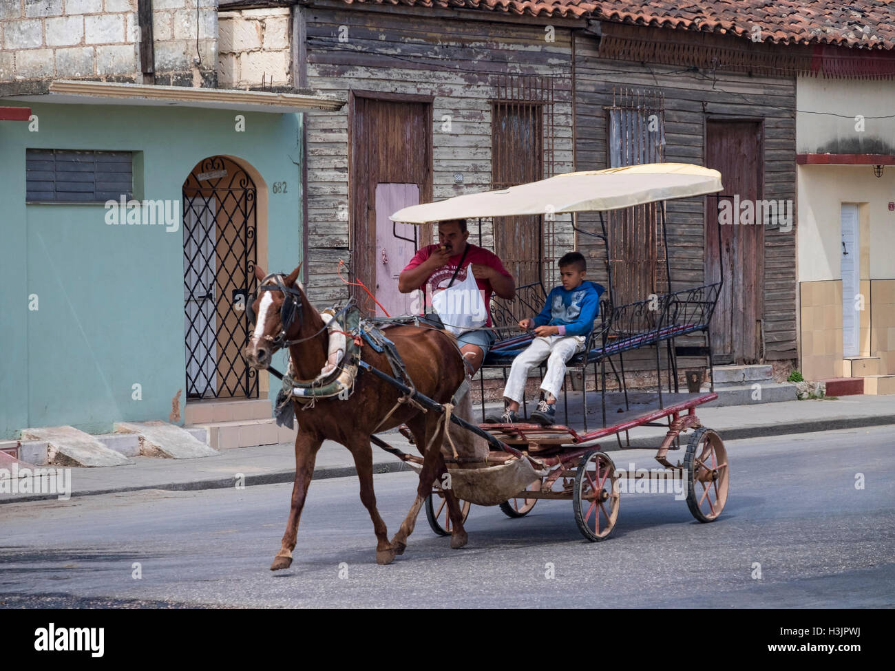 Horse Drawn Carriage in the Town of Cardenas, Cardenas, Matanzas Province, Cuba Stock Photo