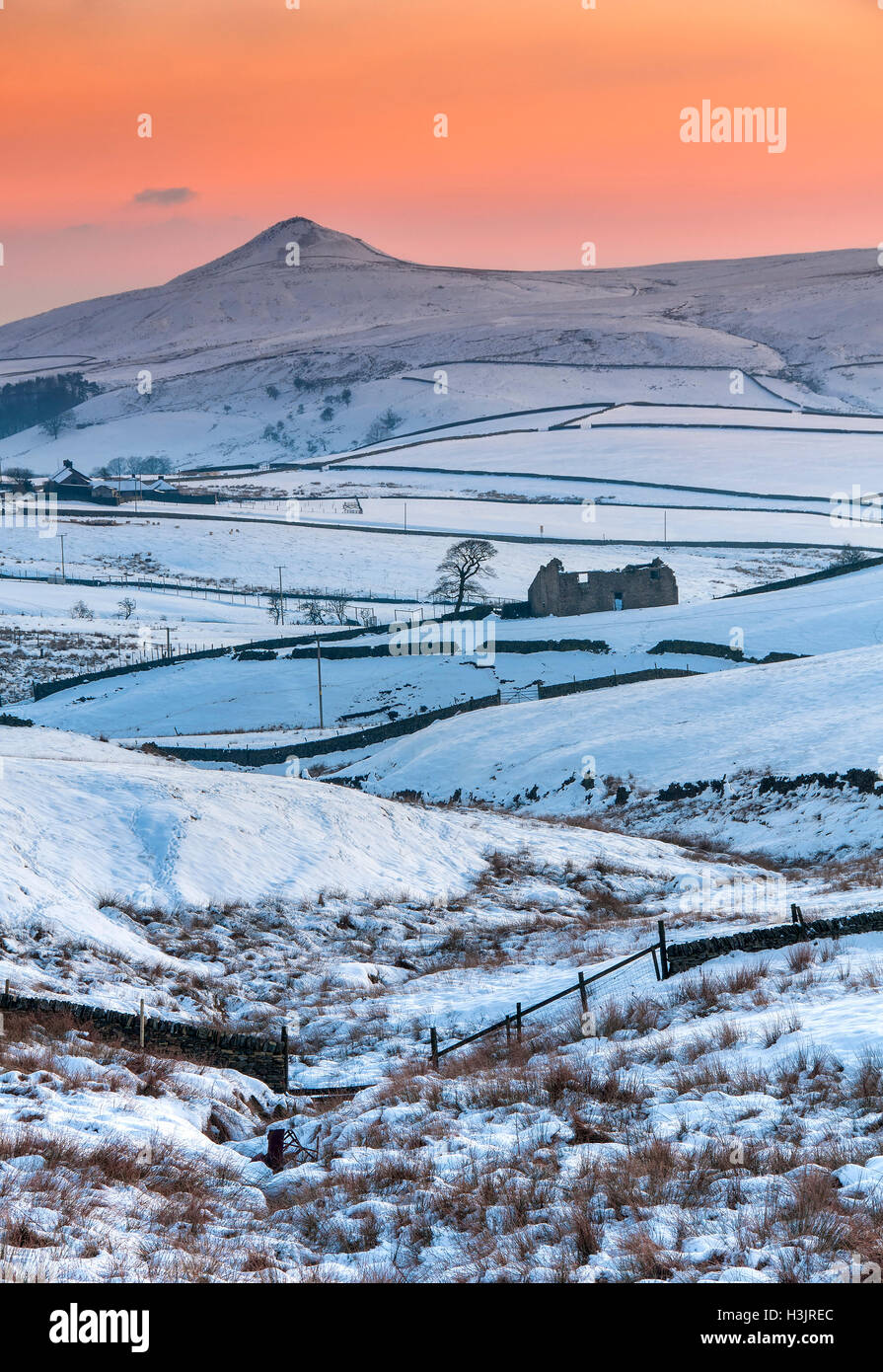 Derelict Barn and Torgate Farm backed by Shutlingsloe in winter at Sunset, Peak District National Park, Cheshire Stock Photo