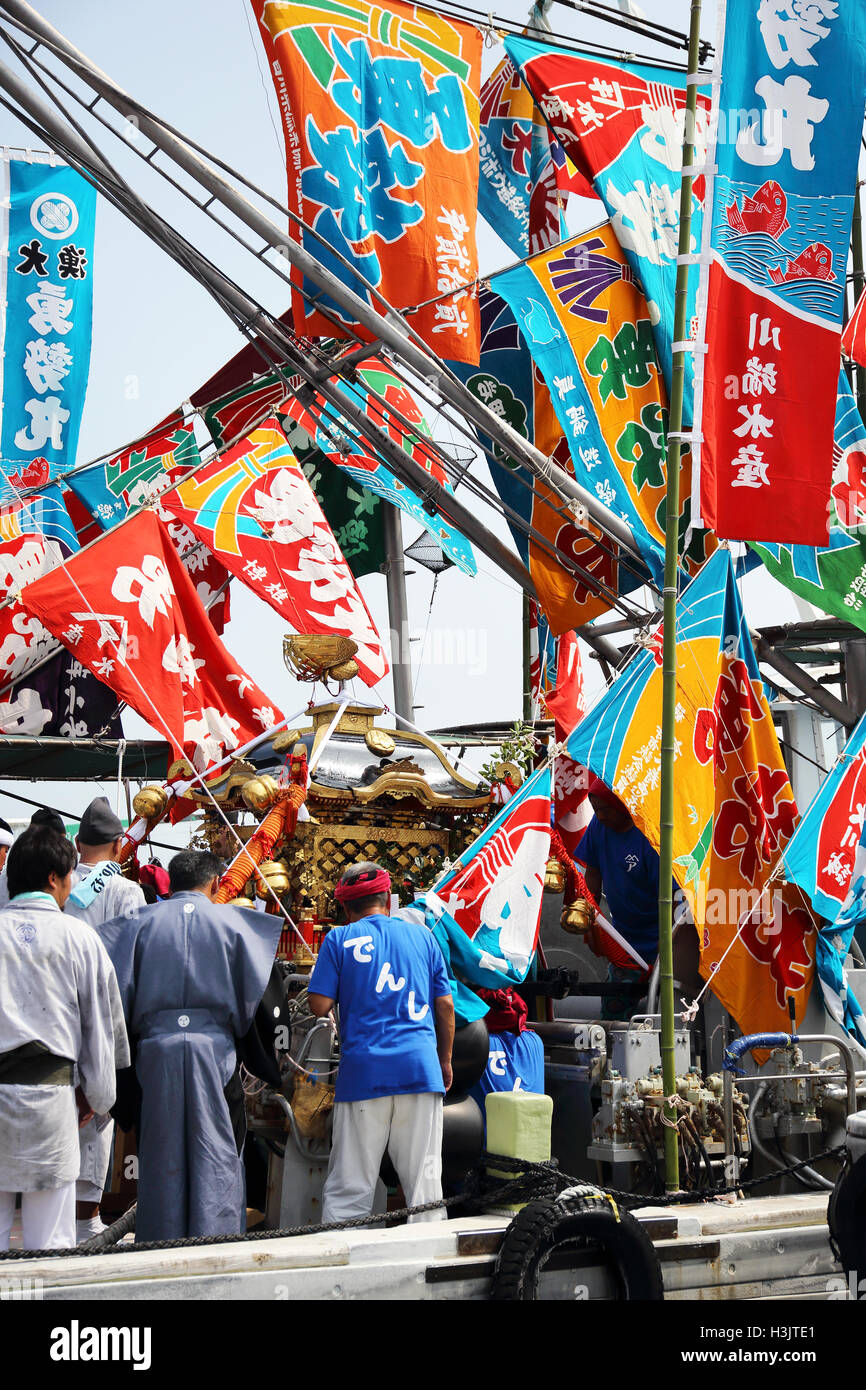 Japanese beautifully decorated nautical flags, fishing boat Stock Photo
