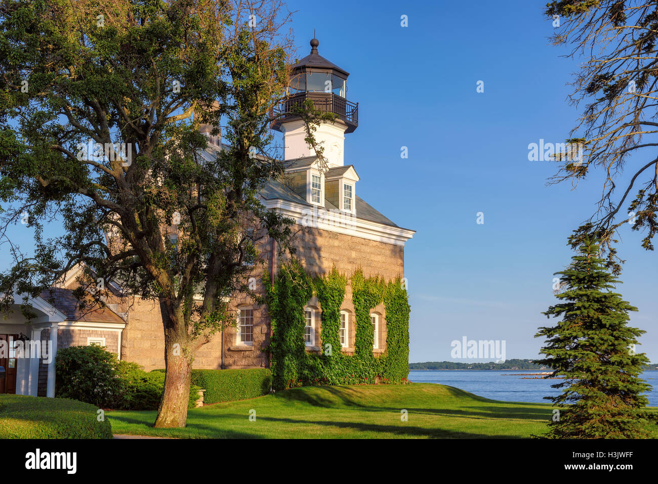 Beautiful Morgan Point Lighthouse at sunset, Noank, Connecticut Stock Photo