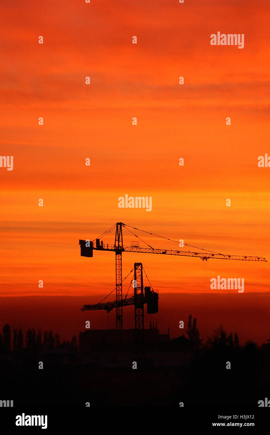 cranes at a construction site Stock Photo