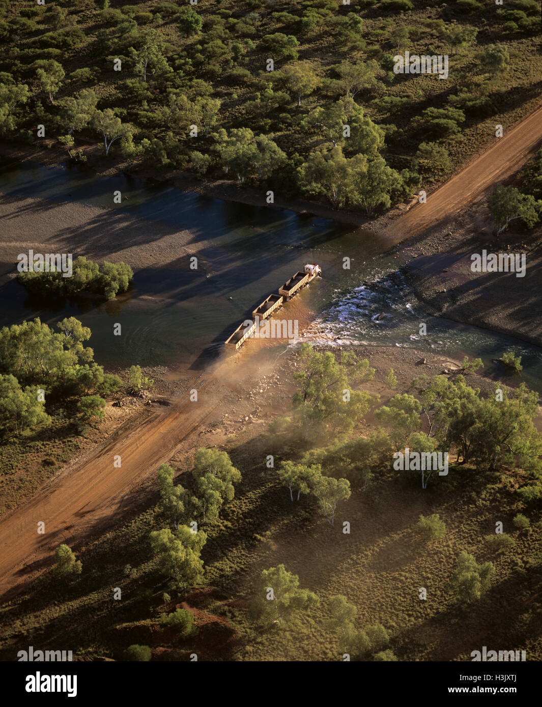 Aerial photograph of a road train carrying iron ore Stock Photo