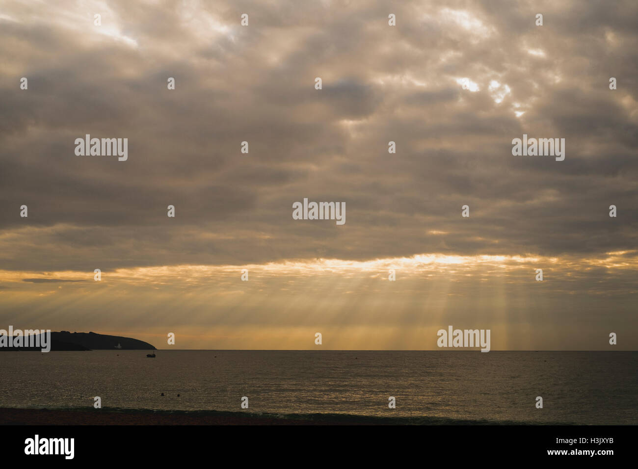 Crepuscular rays as seen from Falmouths Gyllyngvase Beach 8th October 2016 Stock Photo