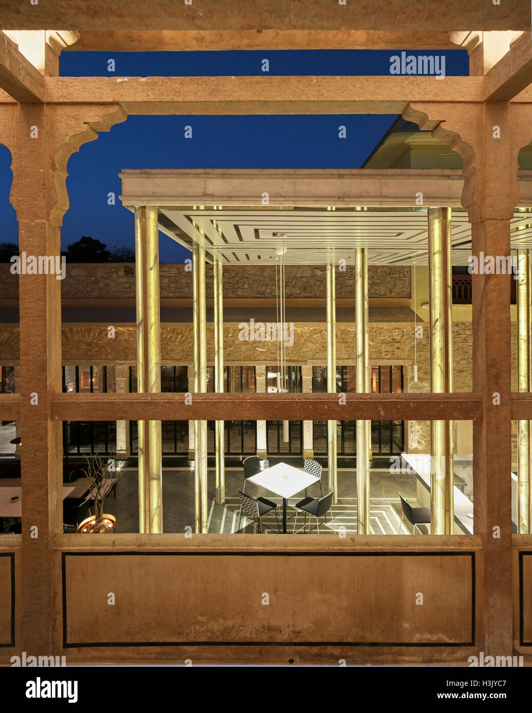 High level view with new bar area framed by historic structure. Baradari at City Palace, Jaipur, India. Architect: Studio Lotus Stock Photo