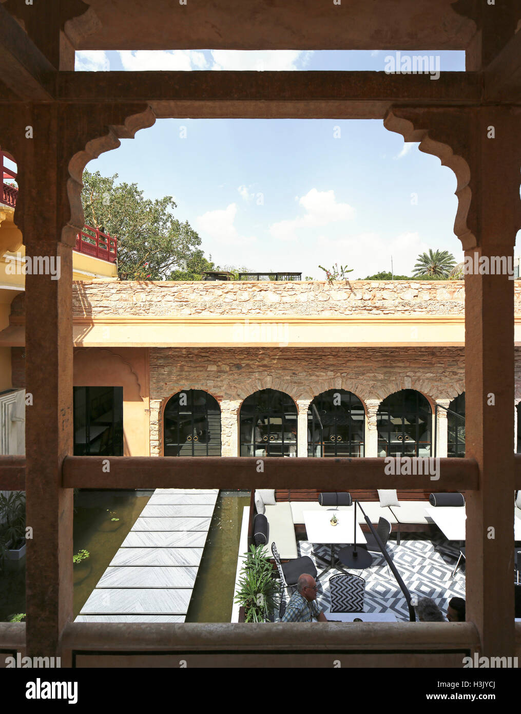 High level view with restaurant area framed by historic structure