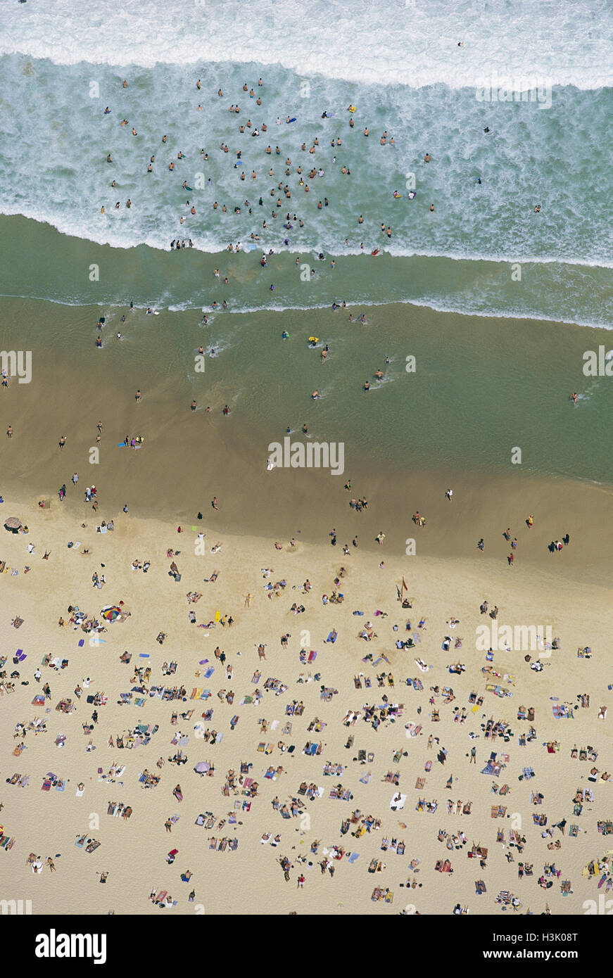 Swimmers and sunbathers on Bondi Beach. Stock Photo