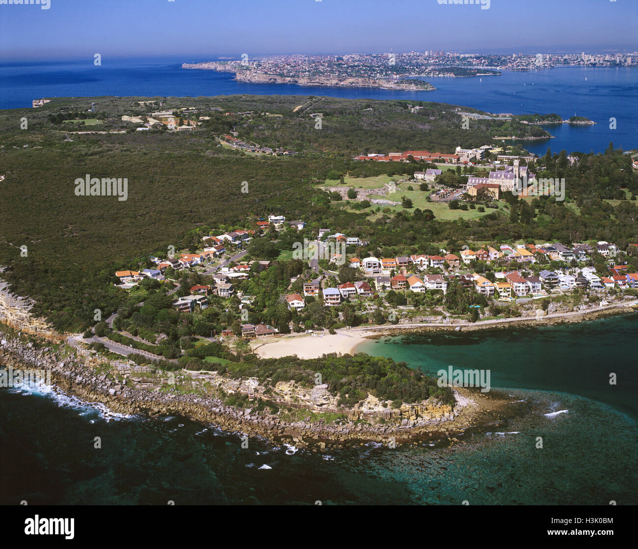 Shelly Beach, North Head and the city in the background. Stock Photo