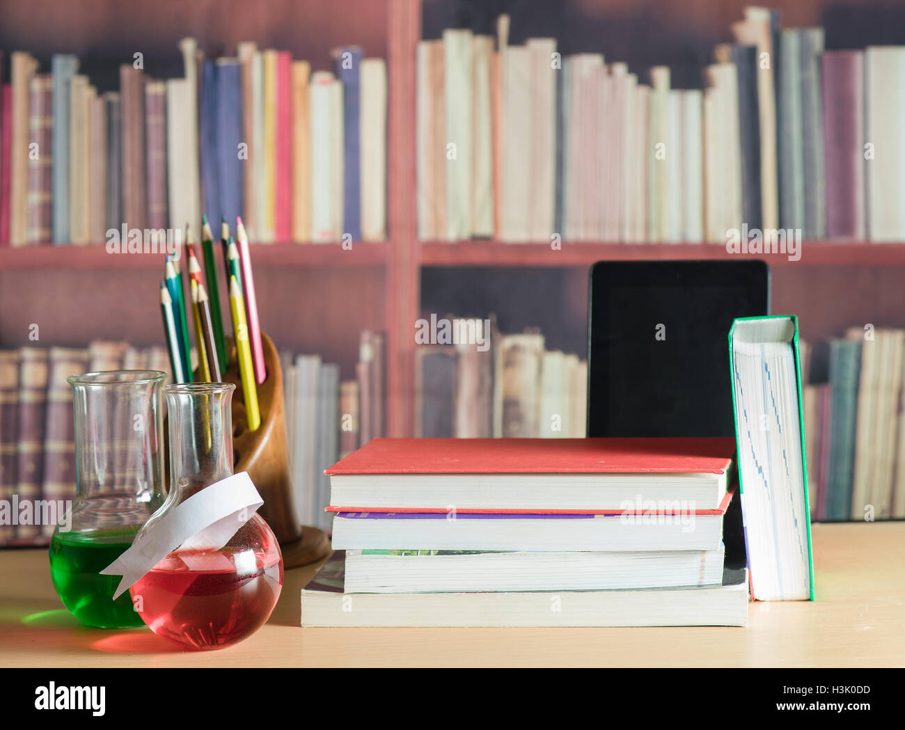 Still life with books, pencils, tablet Stock Photo