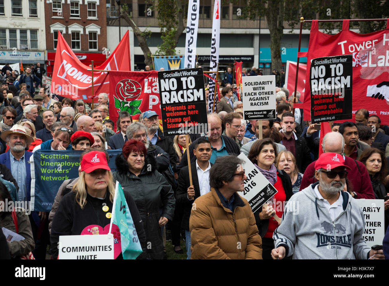London,  UK. 9th October, 2016. People gather in Altab Ali Park for the Cable Street 80 march and rally through Whitechapel to mark the 80th anniversary of the Battle of Cable Street on 9th October 2016 in London, United Kingdom. The demonstration marks the day when tens of thousands of people across the East End, joined by others who came to support them, prevented Oswald Mosley’s British Union of Fascists invading the Jewish areas of the East End. The day, which is recognised as a major turning point in the struggle against fascism in Britain in the 1930s. Credit:  Michael Kemp/Alamy Live Ne Stock Photo