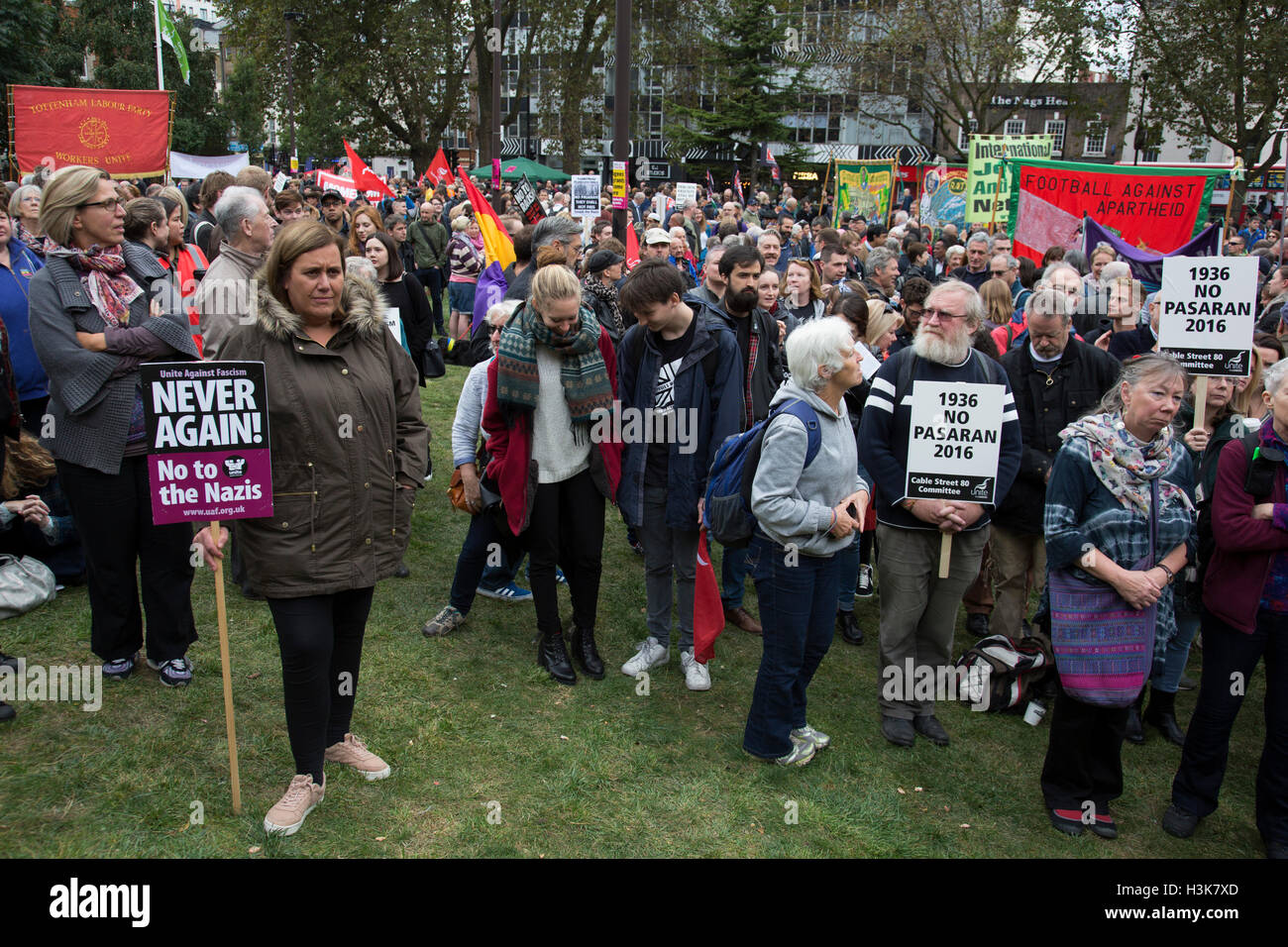 London,  UK. 9th October, 2016. People gather in Altab Ali Park for the Cable Street 80 march and rally through Whitechapel to mark the 80th anniversary of the Battle of Cable Street on 9th October 2016 in London, United Kingdom. The demonstration marks the day when tens of thousands of people across the East End, joined by others who came to support them, prevented Oswald Mosley’s British Union of Fascists invading the Jewish areas of the East End. The day, which is recognised as a major turning point in the struggle against fascism in Britain in the 1930s. Credit:  Michael Kemp/Alamy Live Ne Stock Photo