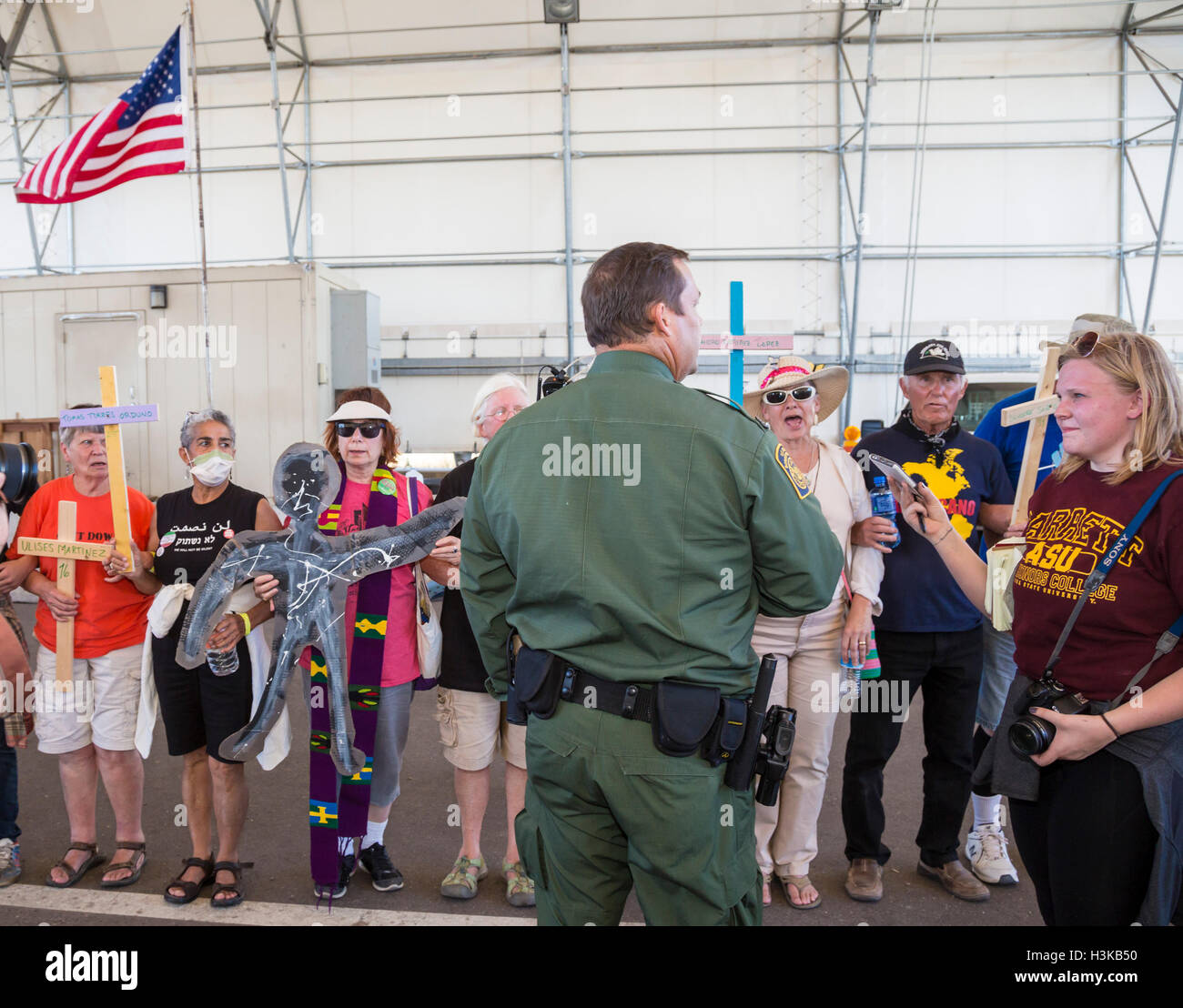 Tubac, Arizona, USA. Immigration reform activists march through the