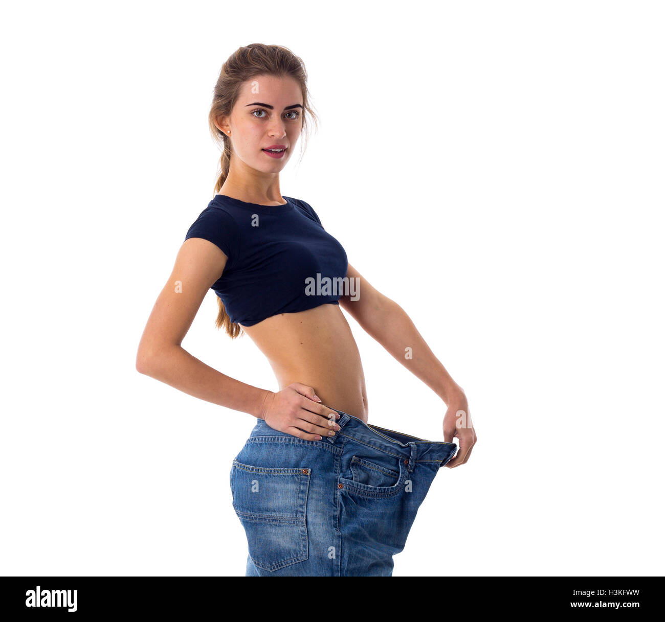 Wearing clothes too big hi-res stock photography and images - Alamy