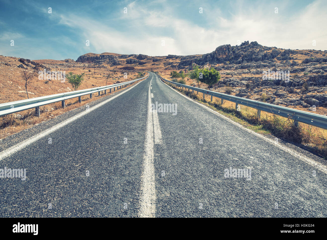 Long Empty Desert Asphalt Road Stock Photo