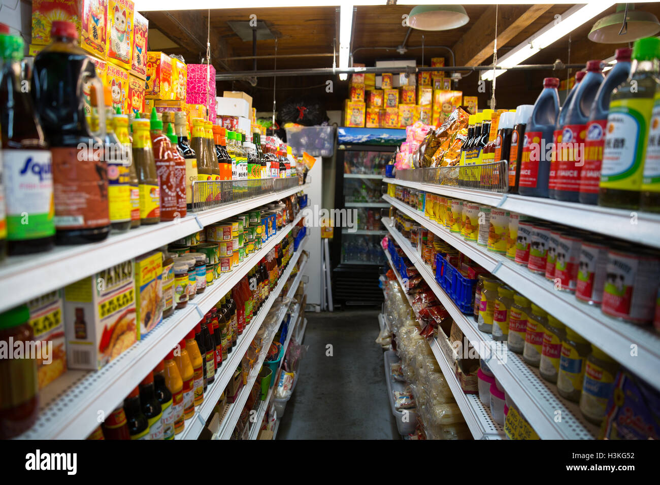 Looking down the aisle inside an ethnic grocery store in Seattle, WA Stock Photo