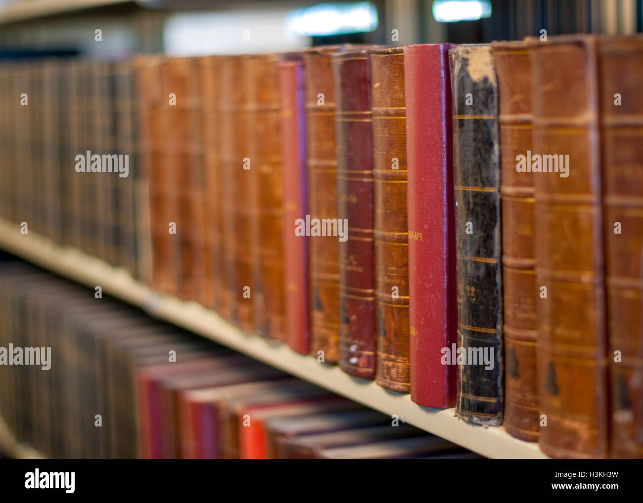 Library books ordered on a shelf Stock Photo Alamy
