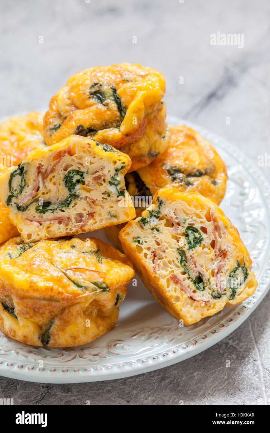 Egg muffins with spinach and bacon Stock Photo Alamy