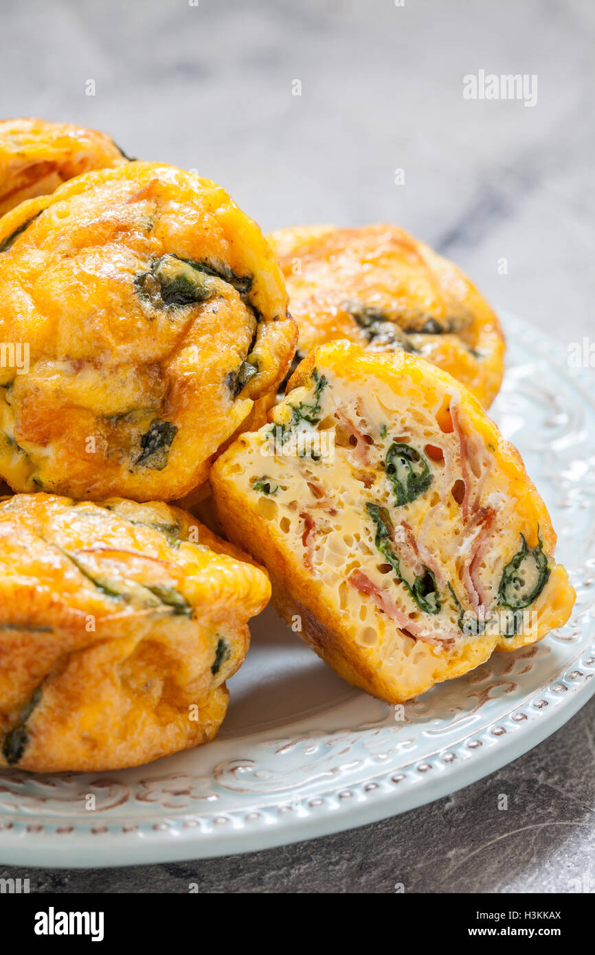 Egg muffins with spinach and bacon Stock Photo Alamy