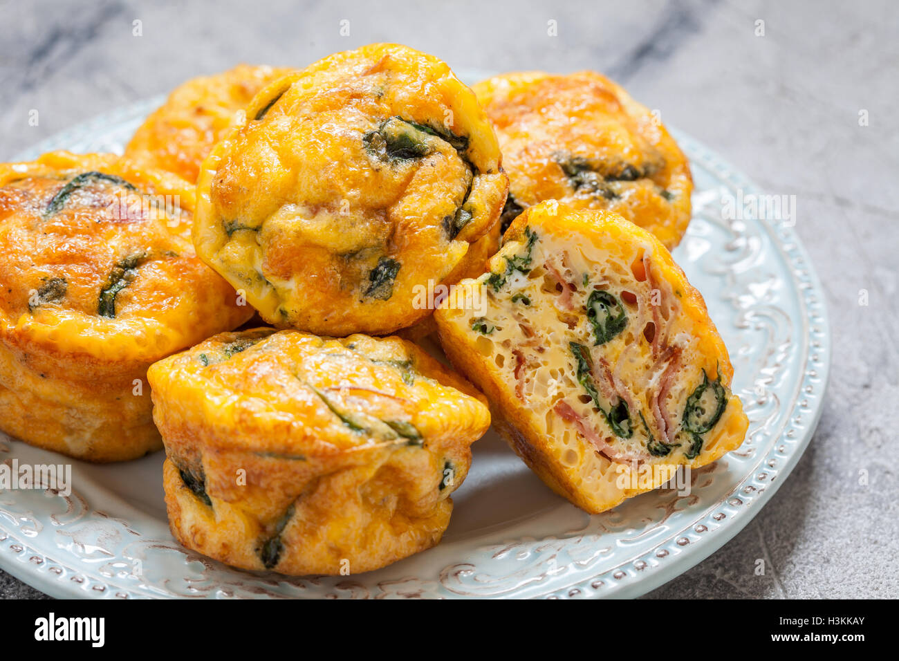 Egg muffins with spinach and bacon Stock Photo Alamy
