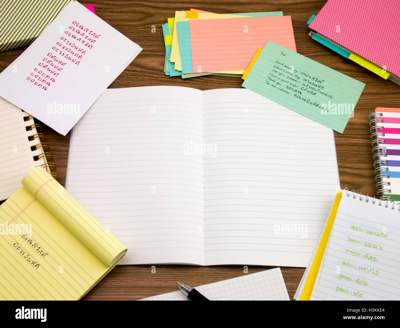 Thai; Learning New Language Writing Words on the Notebook Stock Photo