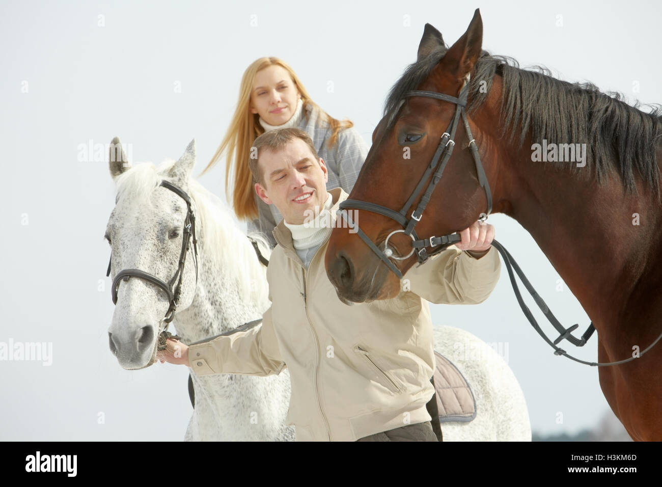 People and horses Stock Photo