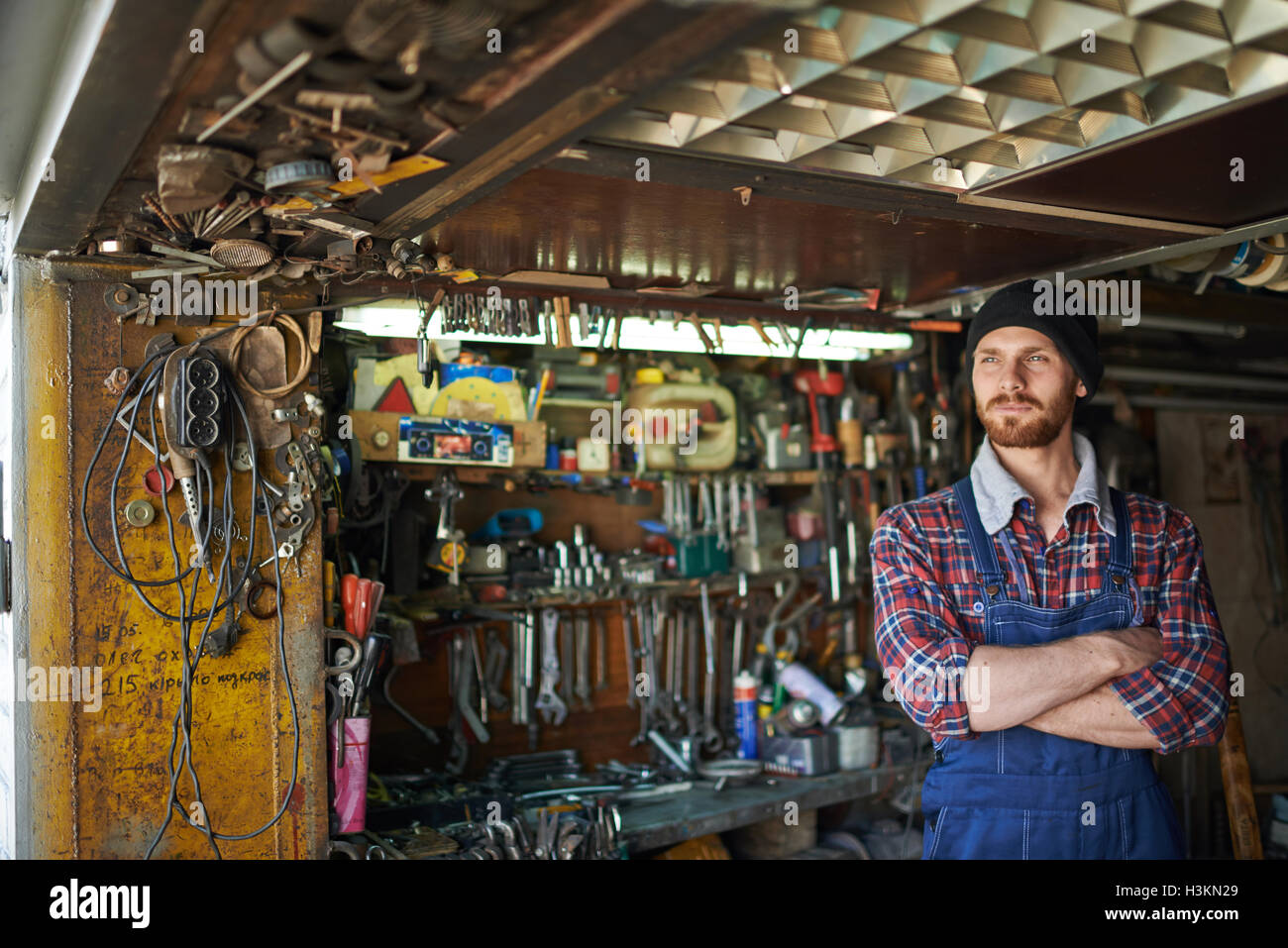 Private entrepreneur and his little workshop Stock Photo