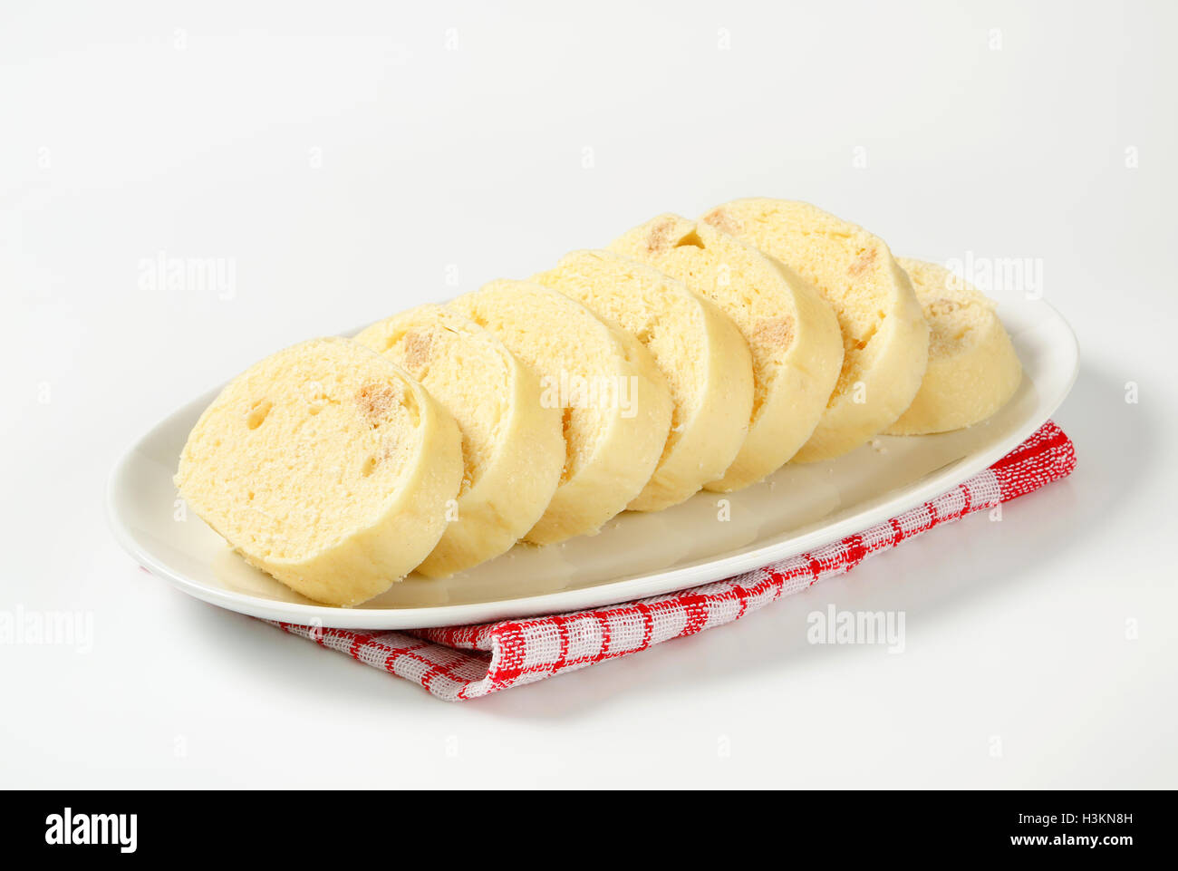Side dish Raised white bread dumplings on plate Stock Photo Alamy