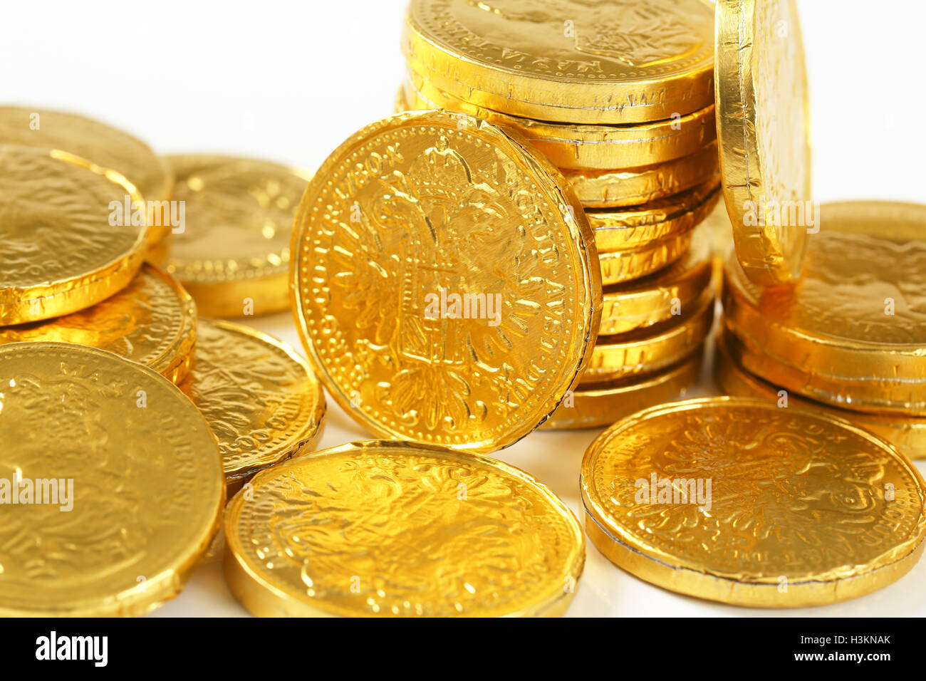 detail of golden chocolate coins stack Stock Photo