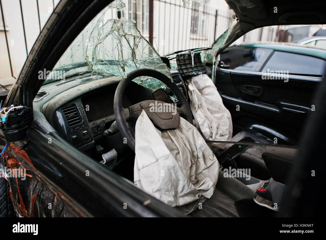Car after accident. Car interior with airbag after crash Stock Photo