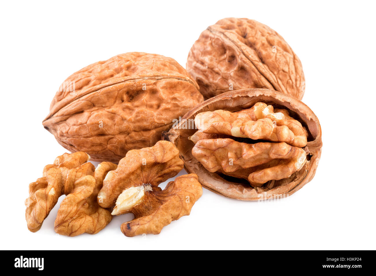 Nuts whole and shelled walnuts isolated on white background Stock Photo