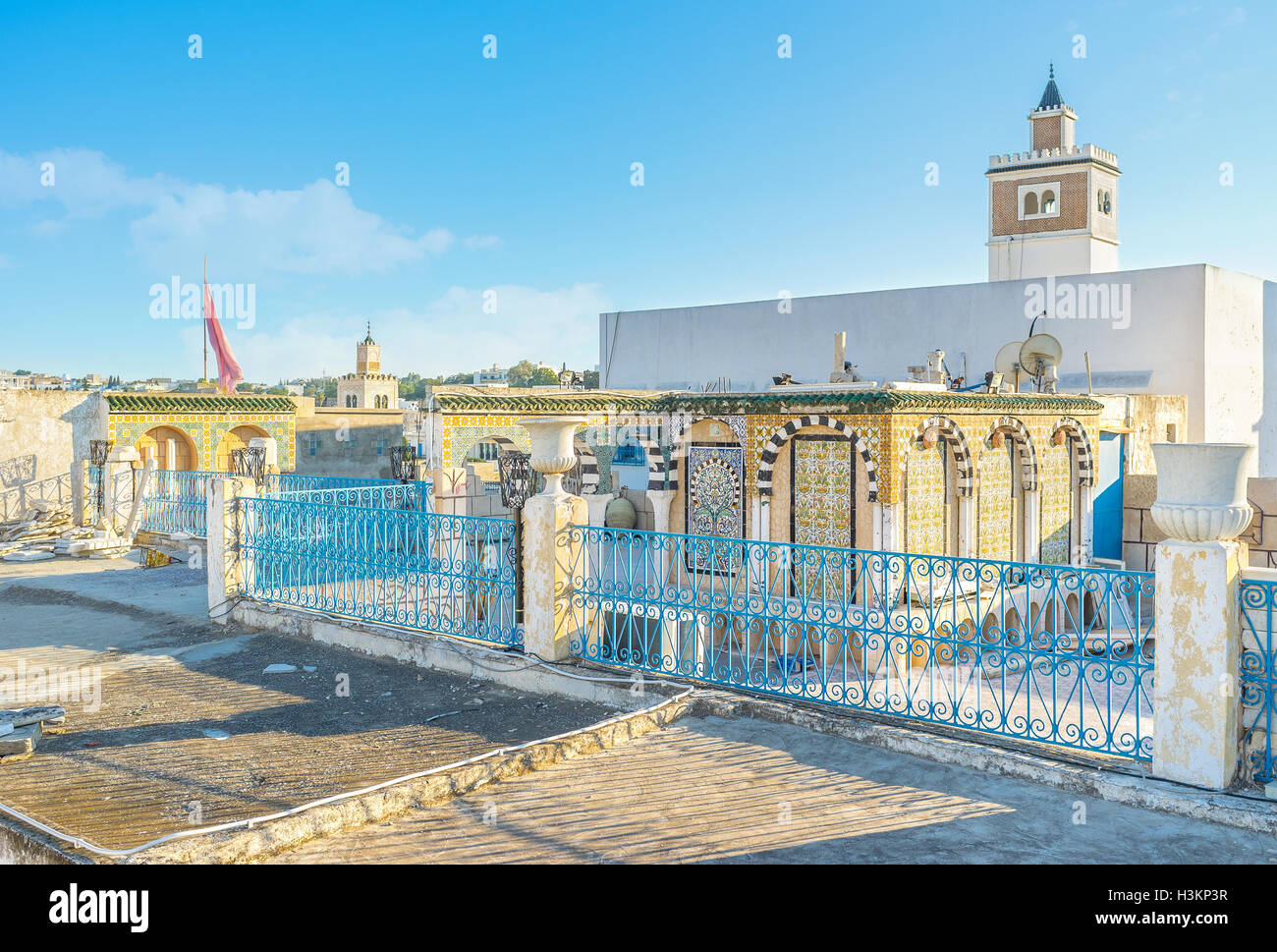 The cozy terraces decorated with glazed tiles are popular in Medina in Tunis, Tunisia. Stock Photo