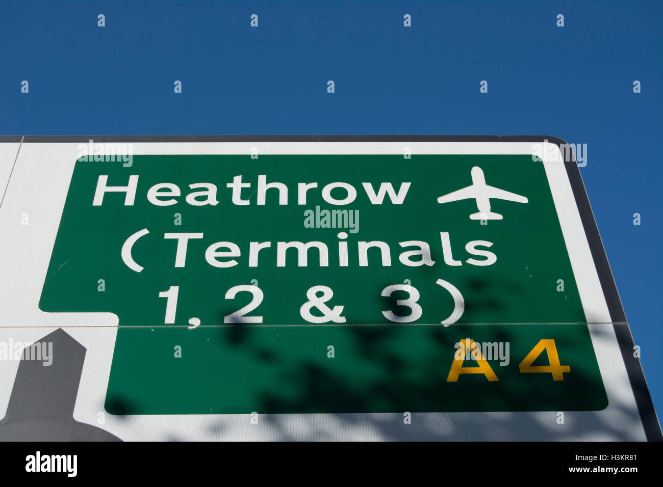 british road sign showing direction to heathrow airport terminals 1,2 and 3, in hounslow, middlesex, england Stock Photo