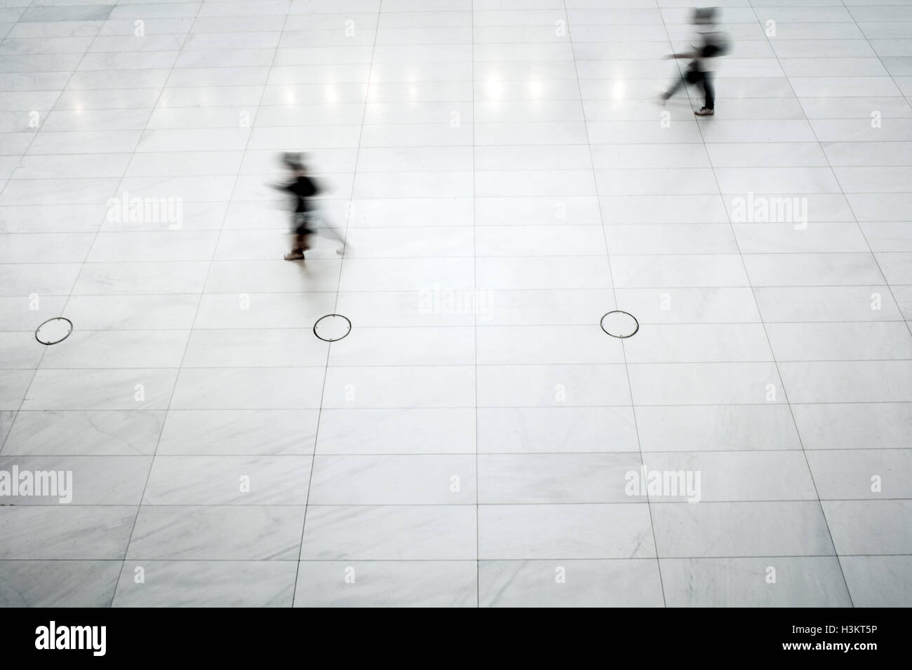 Visitors Cross The White Marble Floor Of The World Trade Center