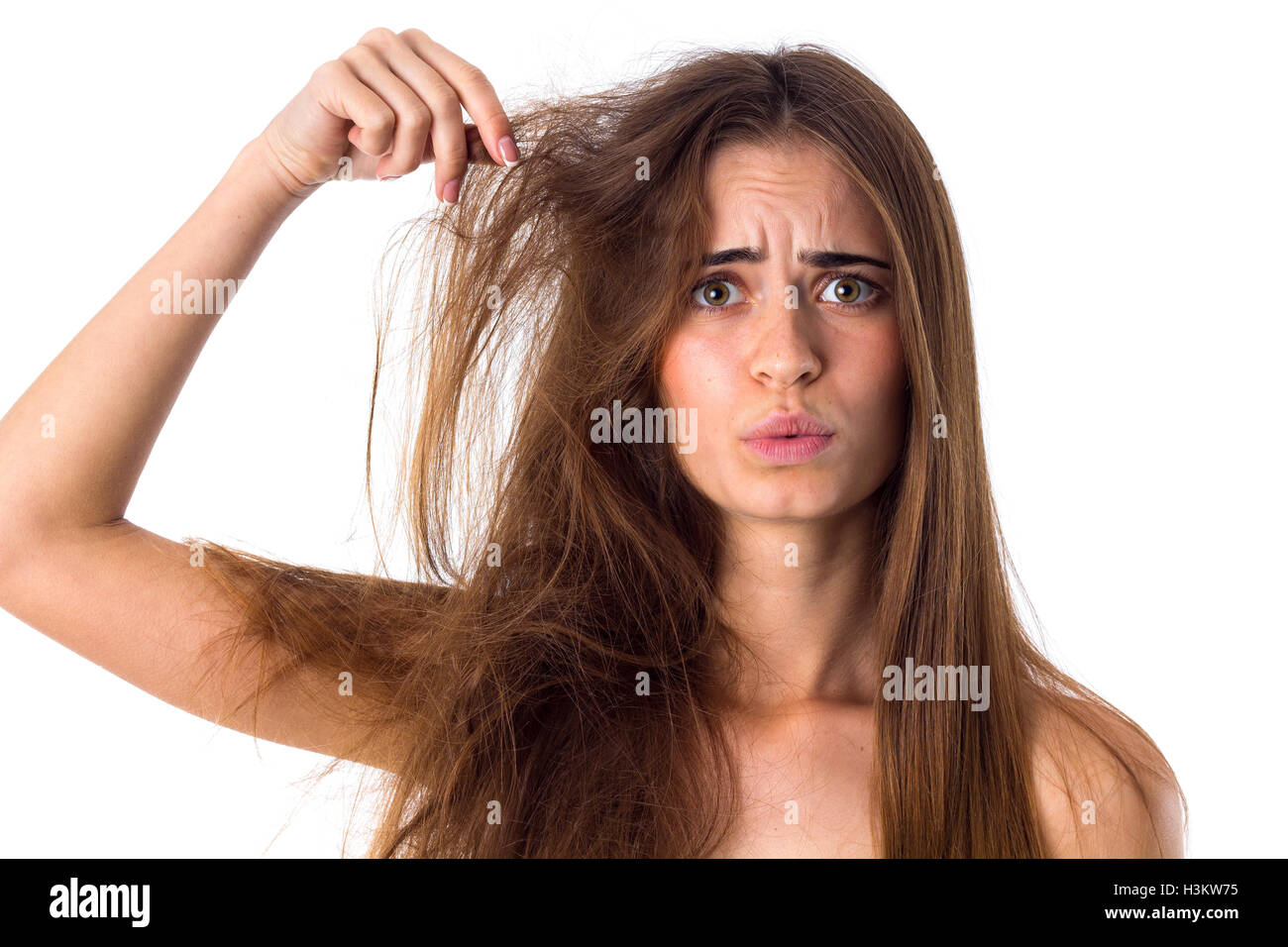 Woman with half of hair straight and half tangled Stock Photo