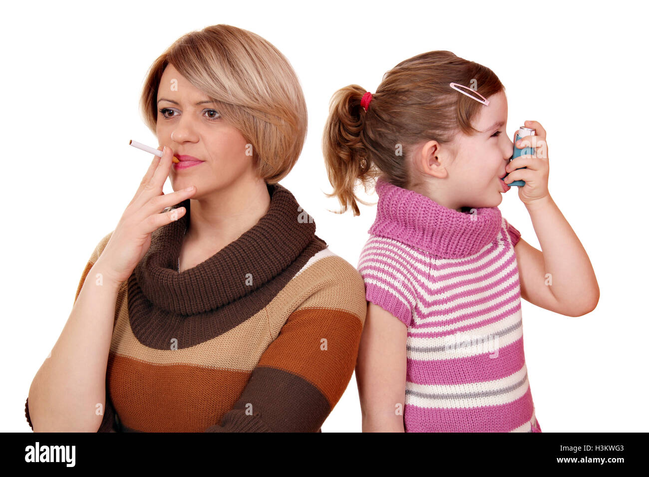 Smoking can cause asthma in children Stock Photo