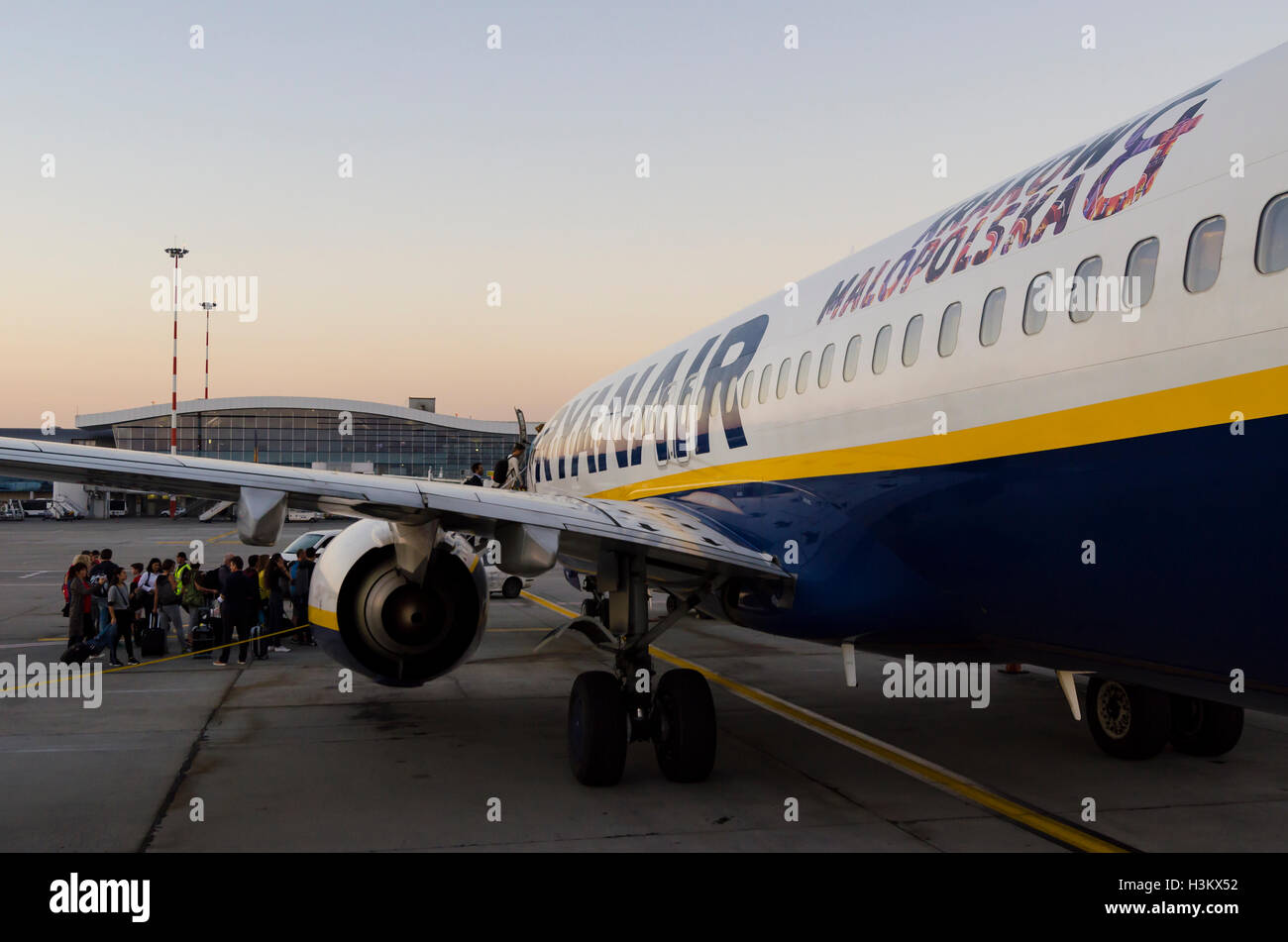 People boarding a Ryanair plane departing from OTP Henri Coanda International Airport, Bucharest, Romania Stock Photo