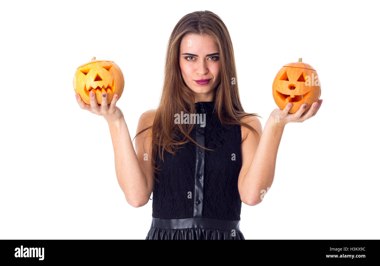 Woman holding two pumpkins Stock Photo