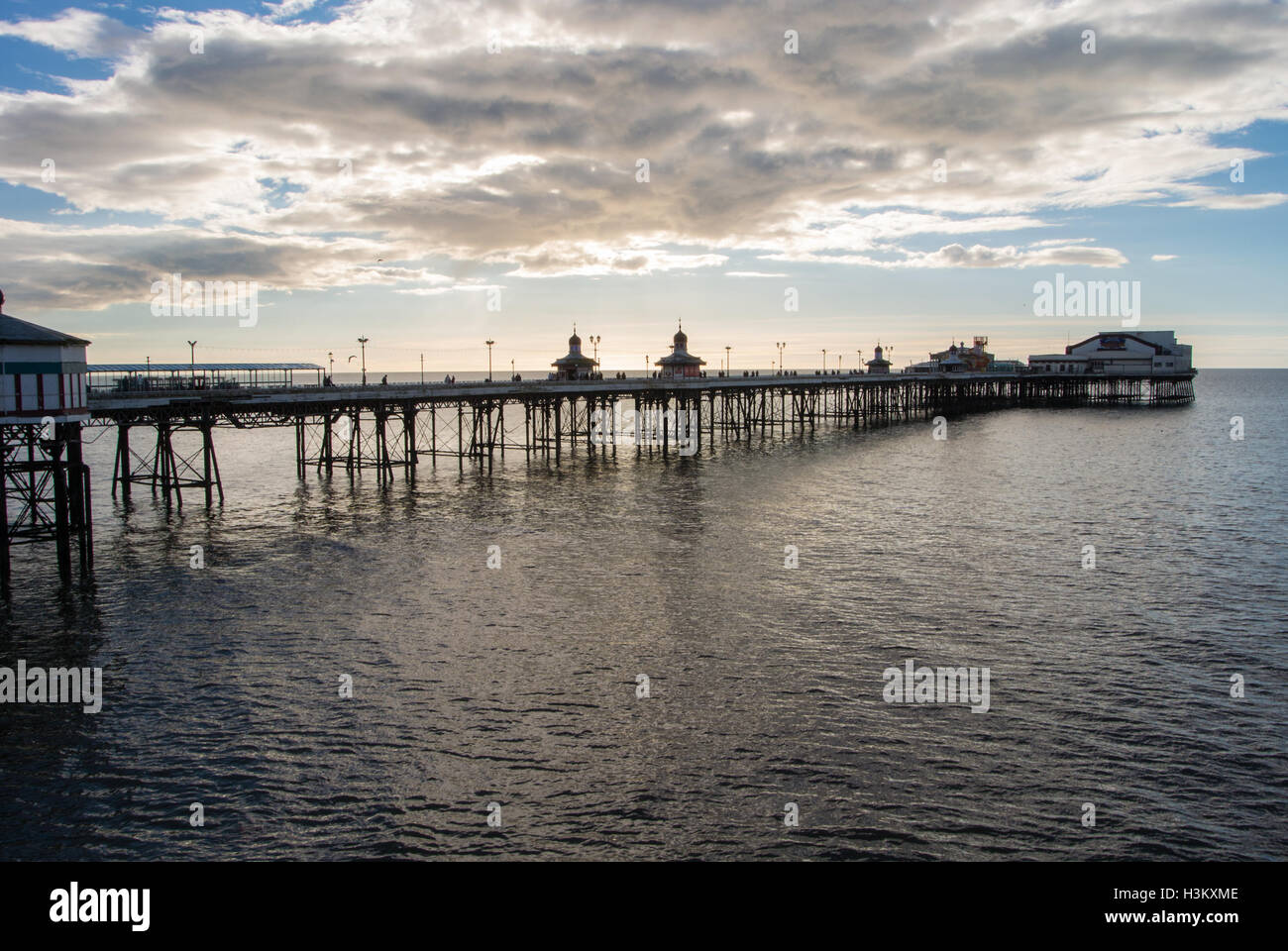 Blackpool's south pier on a sunny and cloudy evening Stock Photo