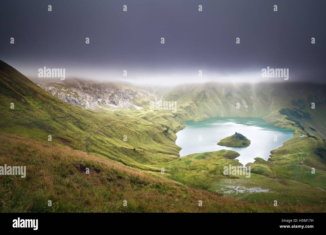 Schrecksee lake during clouded evening, Alps Stock Photo